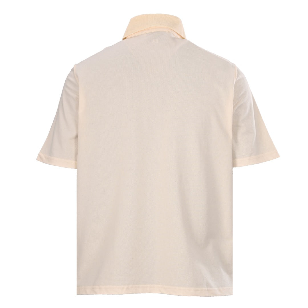 AMI Paris Oversized Ami de Cœur Piqué Cotton Polo Shirt — Ecru