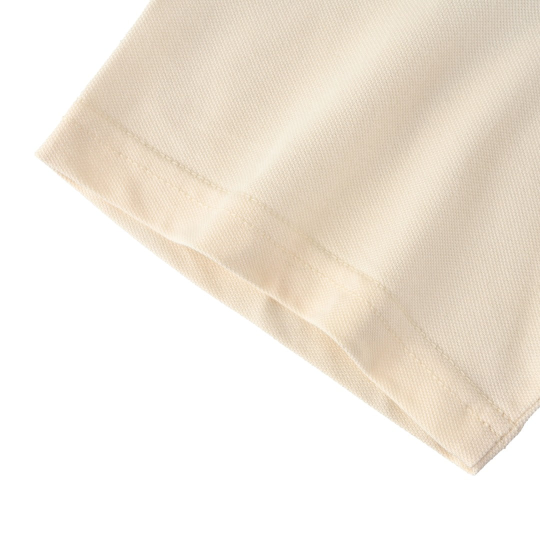 AMI Paris Oversized Ami de Cœur Piqué Cotton Polo Shirt — Ecru